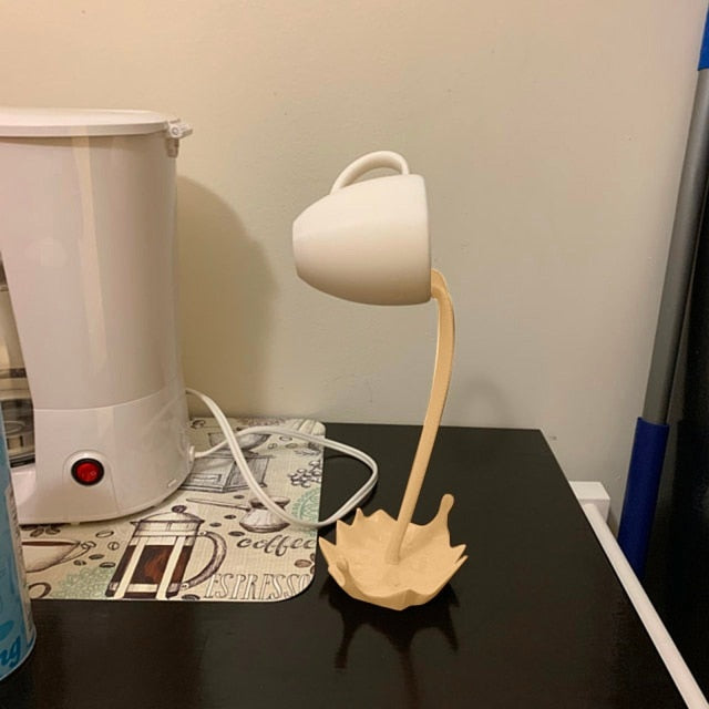 Coffee Spilling Mug Sculpture